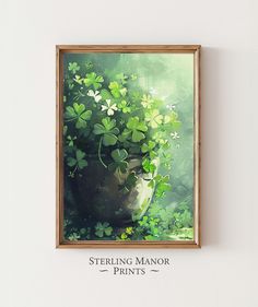 there is a painting on the wall that says sterling manor prints and clovers in a pot