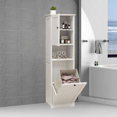 a bathroom with a bathtub, sink and shelf next to the wall in front of it