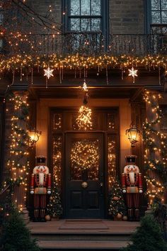 christmas lights decorate the front door of a building with nutcrackers on it