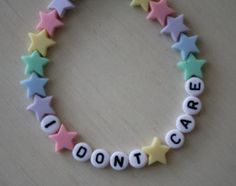 I don't care. Rave Bracelets, Pony Bead Bracelets, Diy Kandi, Kandi Patterns, Bracelet Craft Diy, Kandi Bracelets, Bead Charms Diy