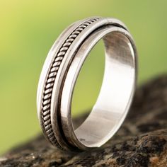 This unassuming sterling silver ring resembles a simple band ring, but it features a freely spinning outer dial that acts as a mediation spinner. Wear this ring to class or the office and never be without a spinner to release stress and increase concentration. Peruvian artisan Carlos Yauri crafts this spinner ring from 925 purity-hallmarked sterling silver at his workshop in the picturesque highlands east of Lima. Increase Concentration, Baroque Art, Simple Band, Take A Breath, Spinner Ring, Spinner Rings, Handmade Sterling Silver, Band Ring, Peru