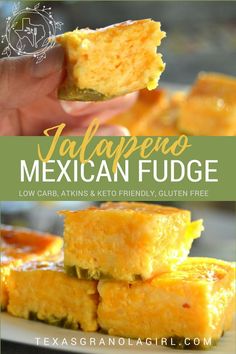 a person holding a piece of mexican fudge in front of some other food on a plate