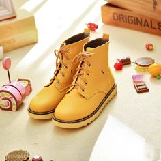 Trendy Yellow Winter Boots, Casual Yellow High-top Boots, Yellow Lace-up Casual Boots, Casual Yellow Winter Boots, Trendy Yellow Boots For Fall, Yellow Ankle Boots For Spring, Casual High Ankle Yellow Boots, Casual Yellow High Ankle Boots, High-top Yellow Boots For Spring