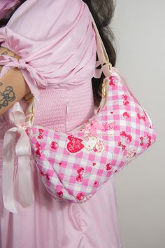 Our Shabby Chic Handbags are handmade with love and quilted cotton featuring nostalgic designs. This vintage-inspired handbag features an inner pocket, complimentary satin ribbons and pink, gold, or silver hardware. Practical and stylish, perfect for everyday travel! Webbing straps are adjustable so you can wear it in different ways - over the shoulder and cross body-style. Dimensions: 12.5 x 6 inches Beautiful Pink Purses, Luxury Vintage Pink Shoulder Bag, Kawaiies Handbags, Cheap Handmade Pink Bags, Pink Bag Handbag, Pink Purse With Ribbons, Cheap Practical Pink Bags, Affordable Practical Pink Bag, Cheap Pink Strawberry Print Bags