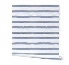 a blue and white striped wallpaper with horizontal lines on the bottom half of it