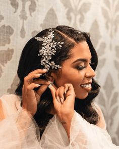 a woman wearing a bridal hair comb