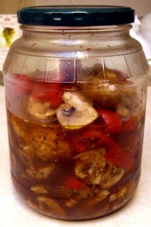 a jar filled with food sitting on top of a counter