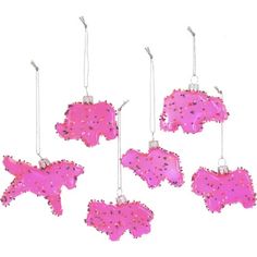 six pink ornaments hanging from strings on a white background, each with different shapes and sizes