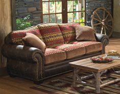 a living room scene with focus on the couch and coffee table in the foreground