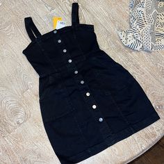 Questions? Leave A Comment Below! Dark Wash Cotton Mini Dress With Pockets, Black Cotton Mini Dress For Spring, Fitted Black Dress With Pockets, Spring Black Cotton Mini Dress, Fitted Mini Black Denim Dress, Fitted Black Denim Mini Dress, Black Fitted Sleeveless Denim Dress, Sleeveless Black Denim Dress, Black Sleeveless Denim Dress