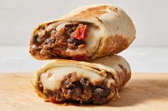 two burritos stacked on top of each other