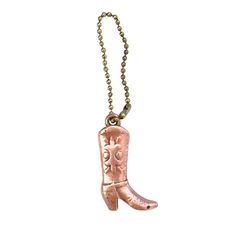 a necklace that has a cowboy boot on it