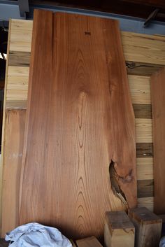 some wood is stacked on top of each other and ready to be put into the wall