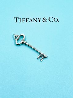 Authentic vintage Tiffany&Co.  sterling silver oval key pendant.Material: sterling silver.Hallmarks: TIFFANY&Co.925. Condition: Pre-owned in very good condition.This item does not include TIFFANY&Co.box and pouch. Tiffany Key Necklace, Tiffany Key, Silver Hallmarks, Vintage Tiffany, Floral Pins, Key Necklace, Tiffany And Co, Lovely Ring, Key Pendant