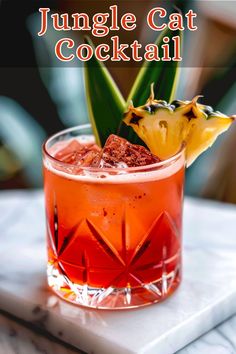 the jungle cat cocktail is garnished with pineapple