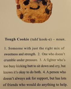 a cookie with chocolate chip cookies on it and the words tough cookie nut - e - nom