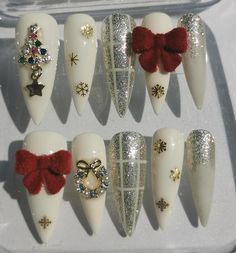 Get ready to dazzle this holiday season with our stunning Christmas Press On Nails! These festive nails are designed for easy application, allowing you to achieve a beautiful, salon-quality look right at home. Whether you're looking for holiday nails adorned with snowflake designs or classic Christmas red bows nails, our collection has everything you need to express your festive spirit. These glue on nails are perfect for any occasion, combining style and convenience with their durable gel finish. Plus, they make a fantastic gift for her, ensuring that your loved ones can also enjoy the magic of Christmas nail art. Elevate your winter nails with these stylish faux nails that offer a perfect blend of fun and elegance. Embrace the holiday cheer with our Xmas press on nails and turn heads whe Bows Nails, Beautiful Salon, Faux Nails, Christmas Nail Art Easy, Festive Nails, Nails Luxury, Christmas 3d, Her Nails