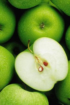 the green apples have been sliced in half