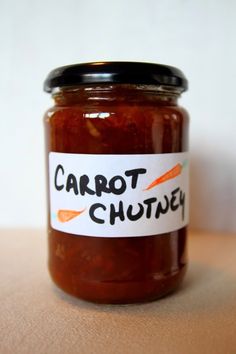 a jar of carrot chut sitting on top of a table