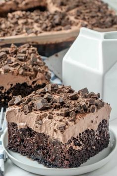 a piece of chocolate poke cake on a plate