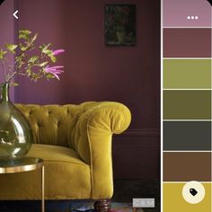 a living room with purple walls and yellow furniture