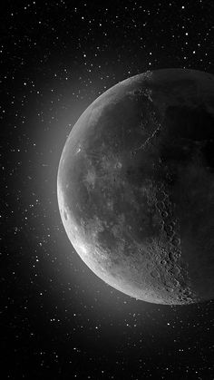 an image of the moon taken in black and white with stars around it, as seen from space