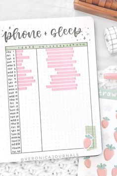 an open planner with strawberries on it