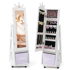 a white jewelry cabinet with two doors open