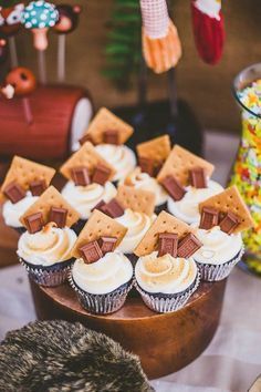 some cupcakes are sitting on a table