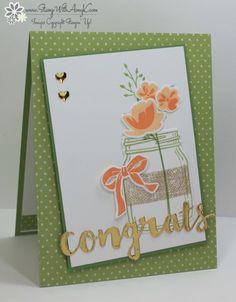 a close up of a greeting card with flowers in a mason jar on the front