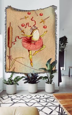 a tapestry hanging on the wall in a living room