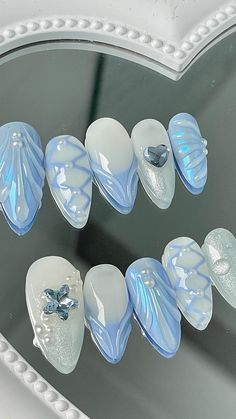 NEW 🌊 Aquamarine Set ~ can’t stop looking at how gorgeous this set is 😭 Custom Sized premium press ons, how could you say no #presson… | Instagram Futuristic Nail Art Designs, Blue Aesthetic Nails Almond, Iridescent Nails Blue, Blue Coquette Nails, Cinderella Nail Art, Soft Blue Nails, Blue Mermaid Nails, Aquatic Nails, Jellyfish Nail Art