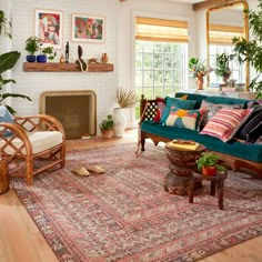 a living room filled with furniture and plants