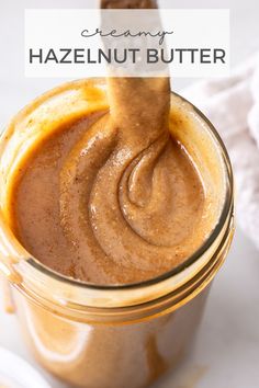 a jar filled with peanut butter on top of a table