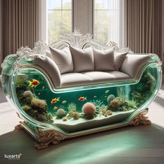 an aquarium in the shape of a couch with fish and corals on it's sides