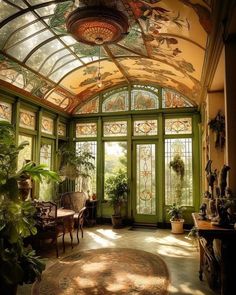 the sun shines through an ornately decorated room with green doors and glass windows