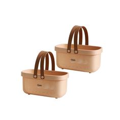 two brown baskets with handles on each side