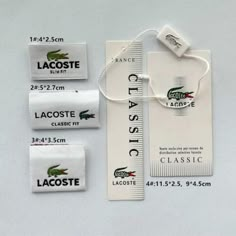 the lacoste labels are laid out next to each other