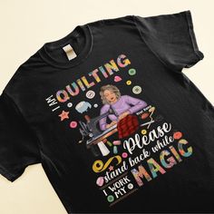 a t - shirt that says i'm quilting please and back while i work at magic