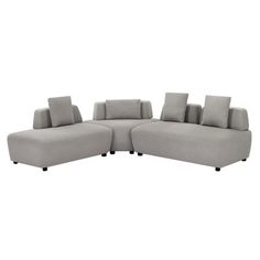 a gray couch with pillows on it