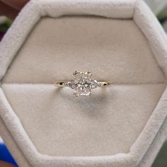 a diamond ring in a velvet box