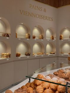 a display case filled with lots of pastries