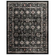 an area rug with black and beige colors