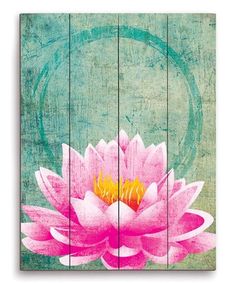 a pink flower painted on wooden planks