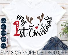 a white shirt with reindeer antlers and the words my 1st christmas is on it