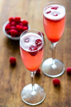 two wine glasses filled with raspberry punch