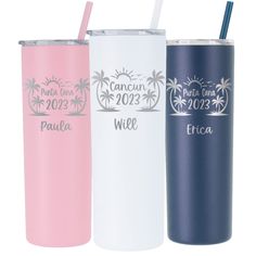 three different colored tumblers with straws in them and palm trees on the side