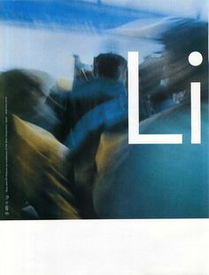 blurry photograph of people in motion with the word li on it's side