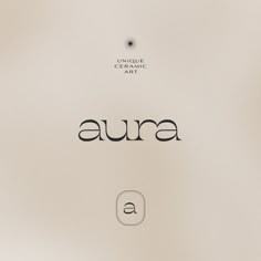 an image of the word aura written in cursive writing