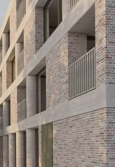 an apartment building with several balconies and windows